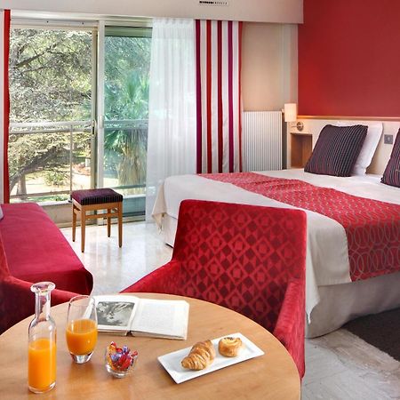 The Originals Boutique, Hotel Les Strelitzias Juan-les-Pins Bagian luar foto